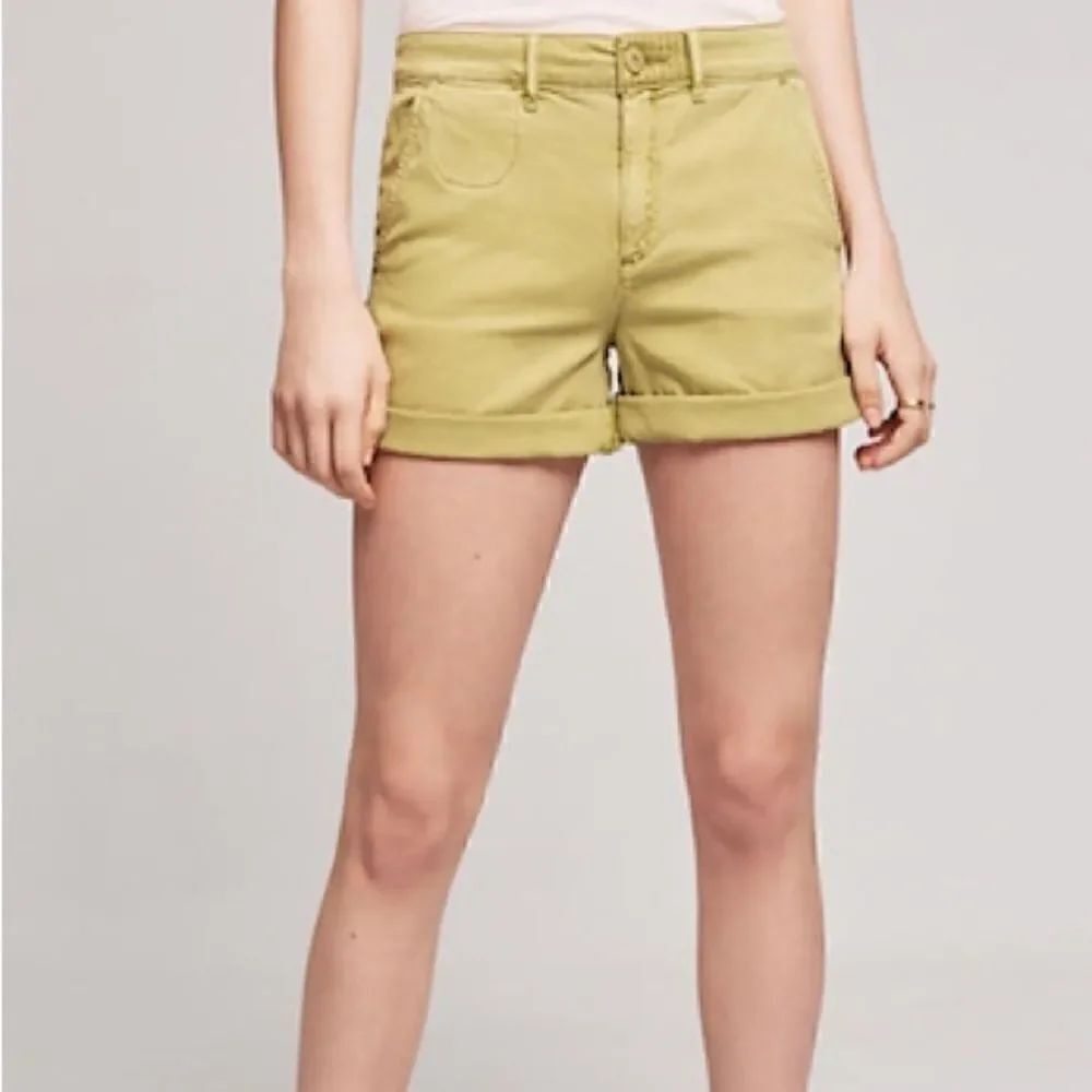 Anthropologie chino relaxed avacado green shorts NWT. 27